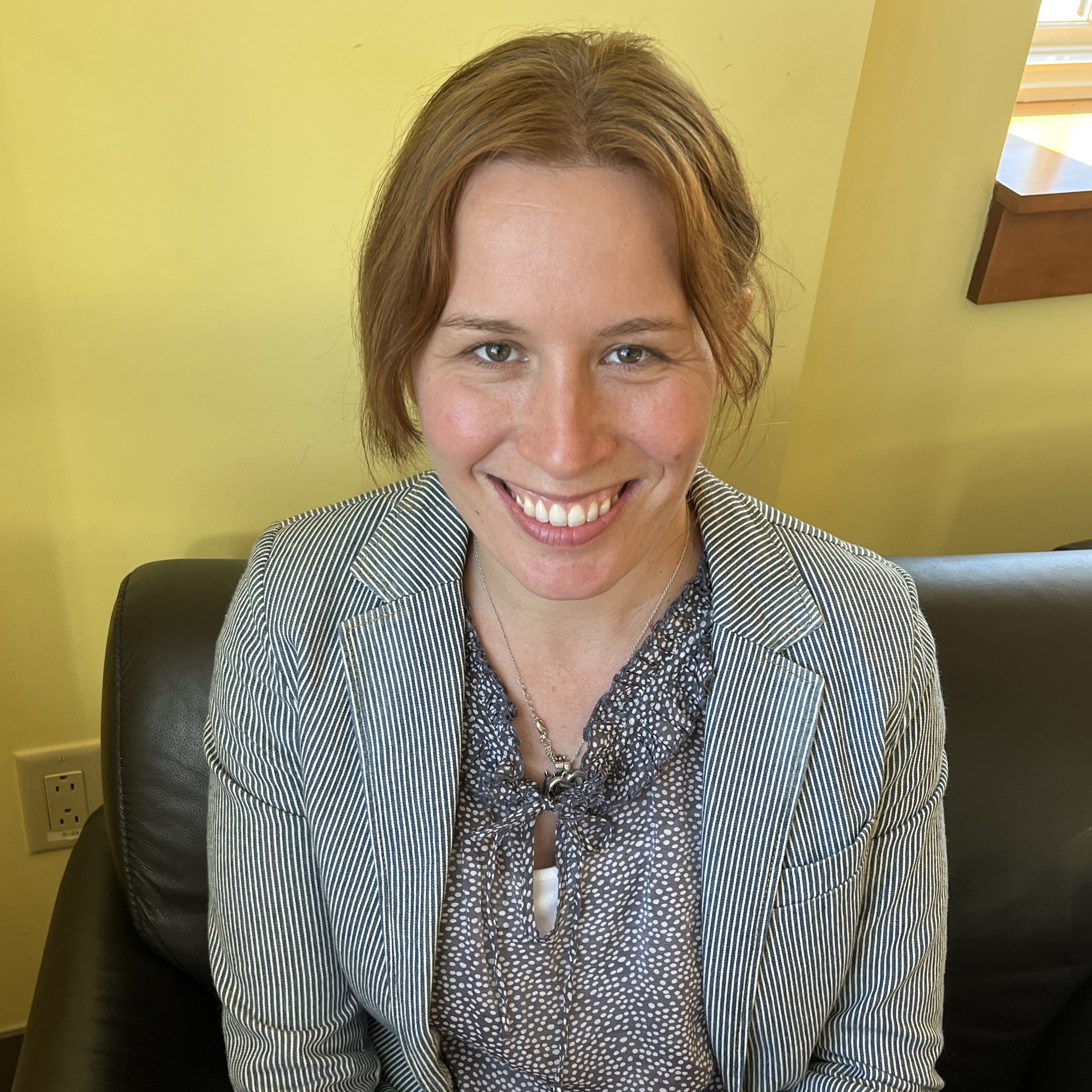 Photo of prof sitting in chair