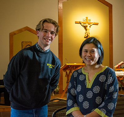 Ethan Nylen, Student and Campus Minister, Claire Morrison in Chapel