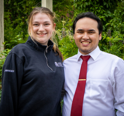 Photo of STU Mooters Jillian and Jonathan on campus in summer