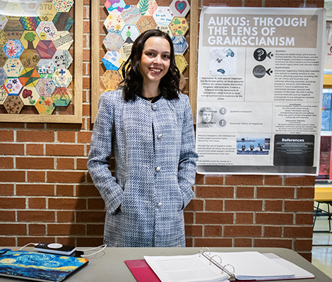 Female student presenter at SRIF 2024 poster presentation