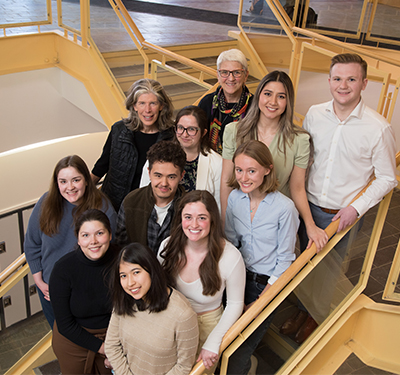 Group shot of students, Mayor and professors near stairwell