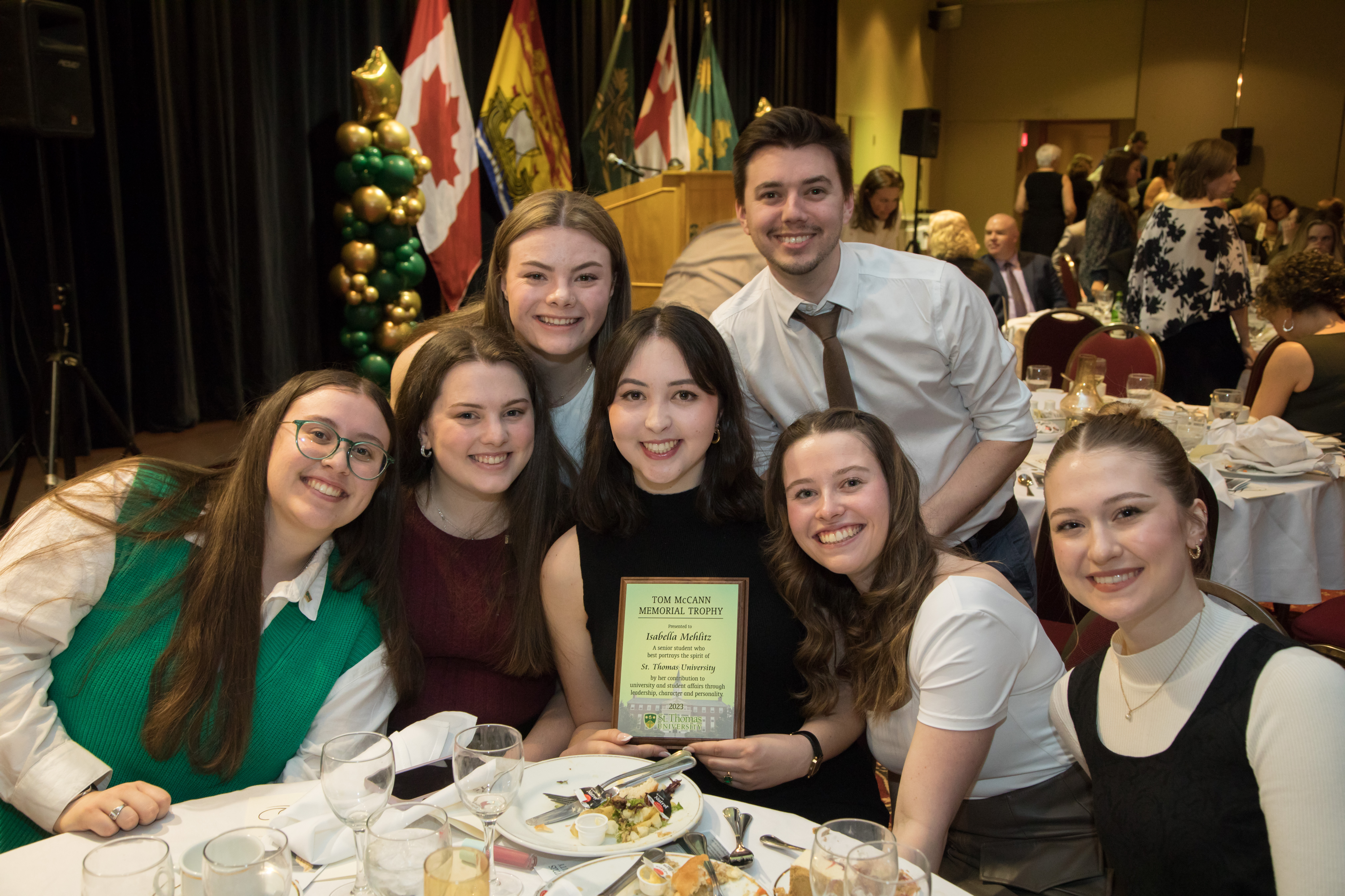 Isabella Mehlitz with friends at grad dinner