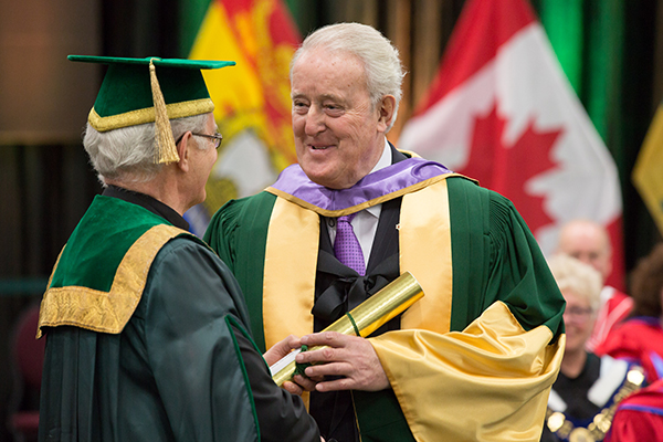 Photo of Brian Mulroney getting a degree at STU