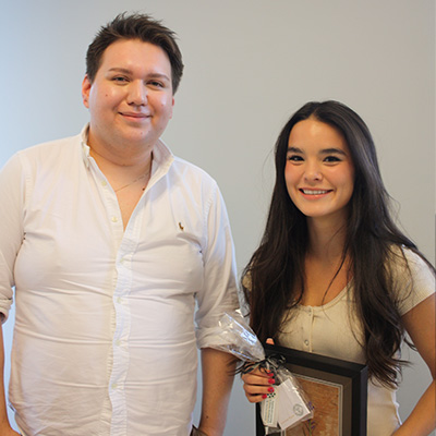 STUdent Jazna Ward is presented the FutureWabanaki Student Excellence Award by Indigenous Experiential Learning Coordinator Gage Perley