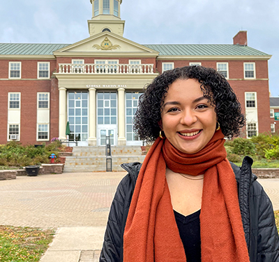 Photo of a student on campus wearing a scarf