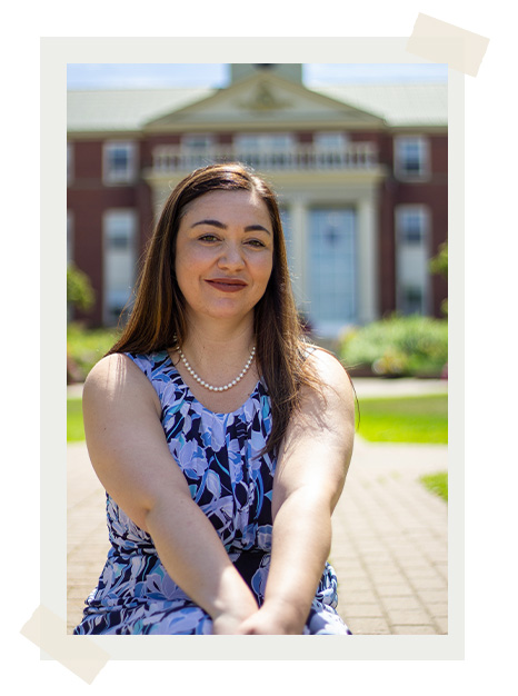 Dr. Amanda DiPaolo in front of George Martin Hall