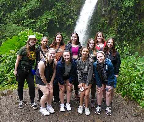 Students near waterfall in Costa Rica