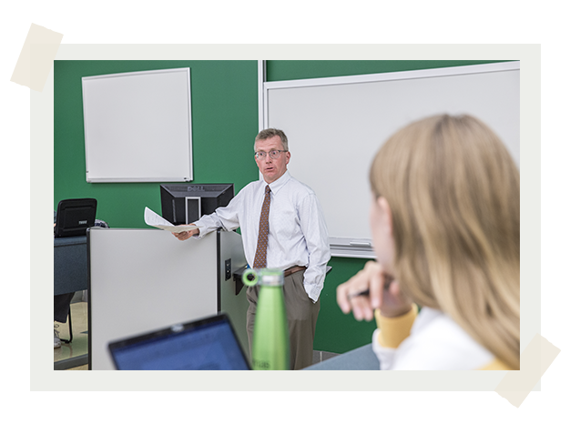 A photo of Professor Tom Bateman teaching