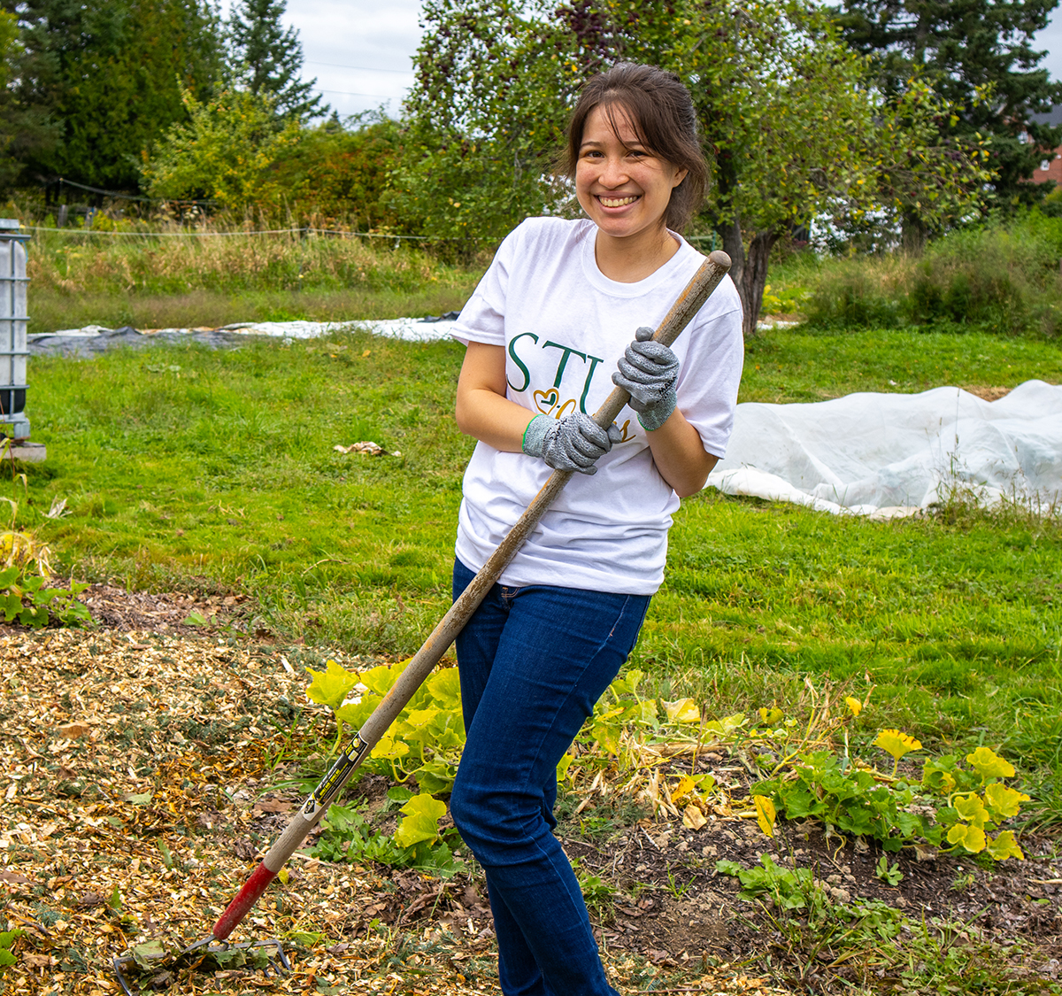 Montse Duran with shovel at Hayes Farm